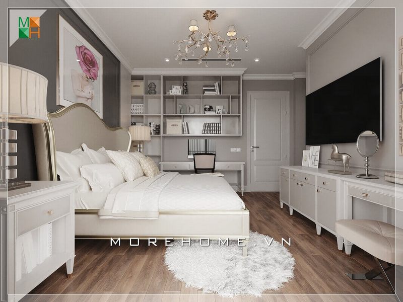 Mẫu thiết kế nội thất phòng ngủ chung cư tân cổ điển là sự kết hợp hoàn hảo giữa tinh túy cổ điển và sự sáng tạo hiện đại. Điều đó có thể thấy rõ qua các chi tiết như họa tiết uốn lượn điêu luyện phía đầu giường, kệ tivi và kệ giá sách hiện đại. Những điều này tạo nên một không gian phòng ngủ đẹp mặt và mang lại những giá trị tuyệt vời.